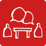 Icon Zwei Menschen sitzen am Tisch und reden